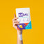 Hand holding up a CHEAL Multivitamin Patch pouch, with a white patch on the wrist